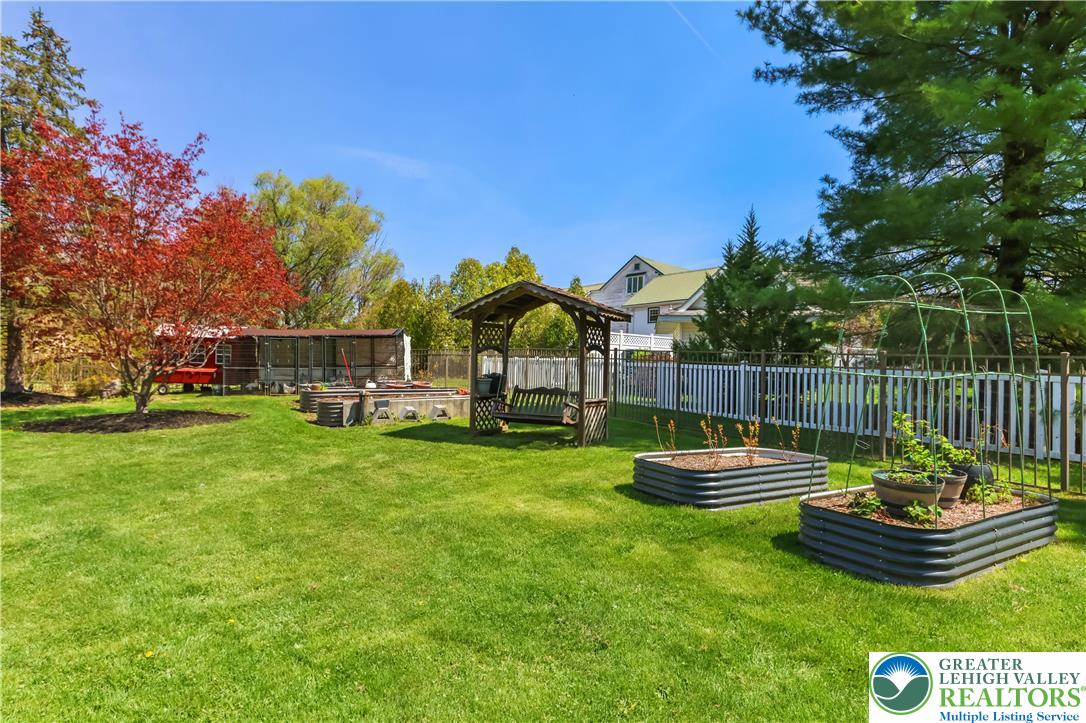 4263 Park Avenue Slatington, PA 18080 - Photo 8 of 54 a view of a house with backyard and sitting area