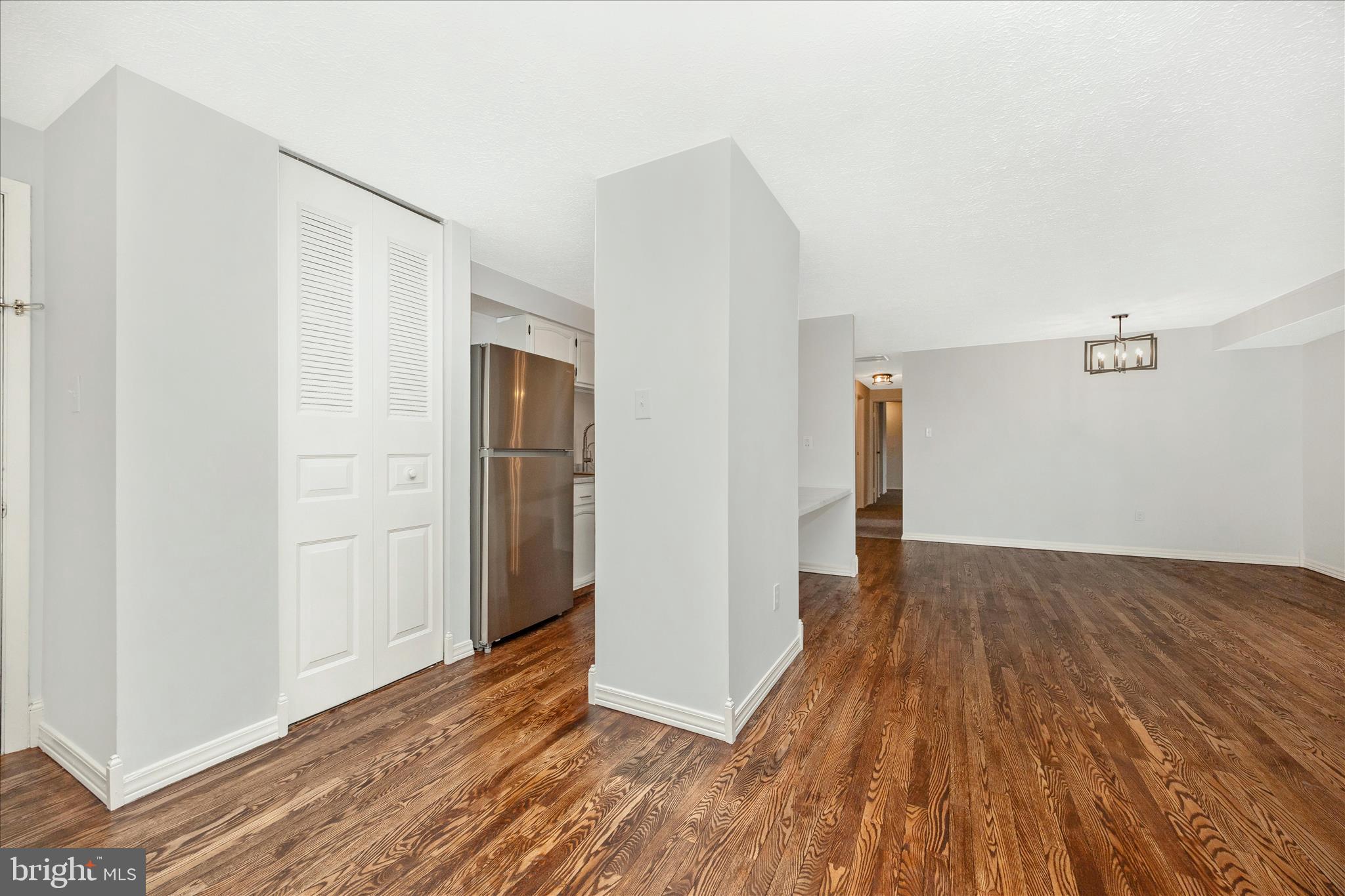 550 Heather Ridge Drive, Unit K Frederick, MD 21702 - Photo 21 of 45 a view of hallway with wooden floor