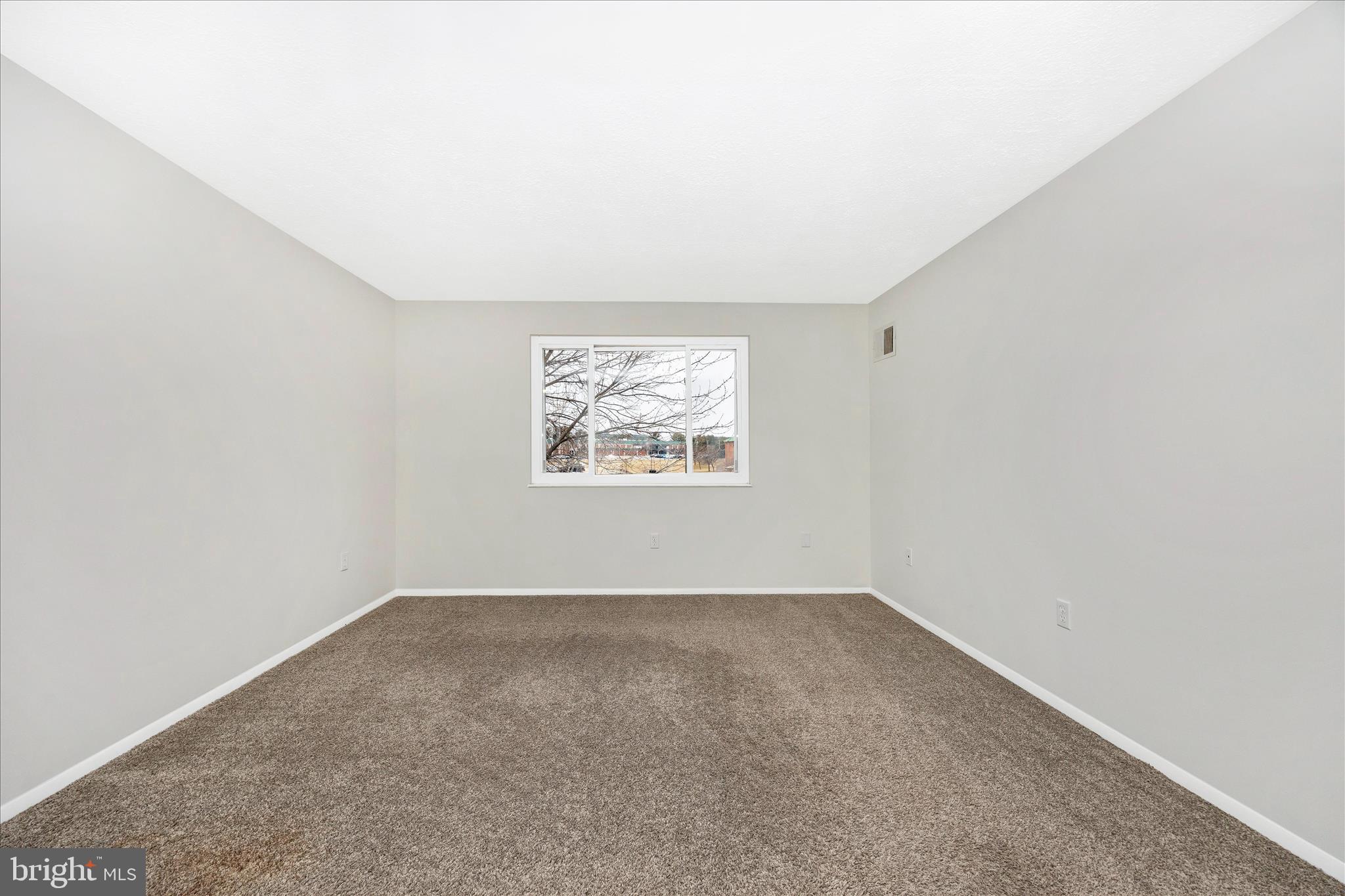 550 Heather Ridge Drive, Unit K Frederick, MD 21702 - Photo 26 of 45 an empty room with windows