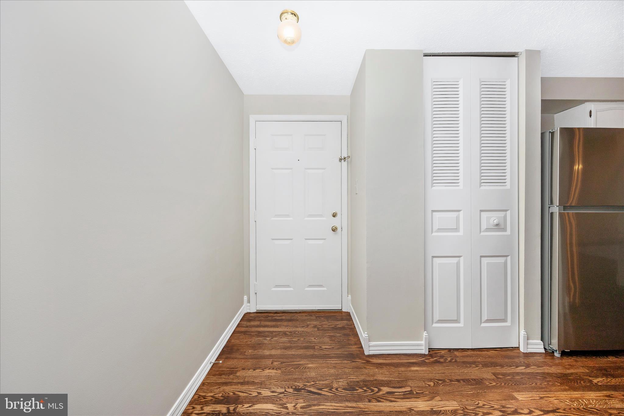 550 Heather Ridge Drive, Unit K Frederick, MD 21702 - Photo 3 of 45 a view of a livingroom with wooden floor and closet
