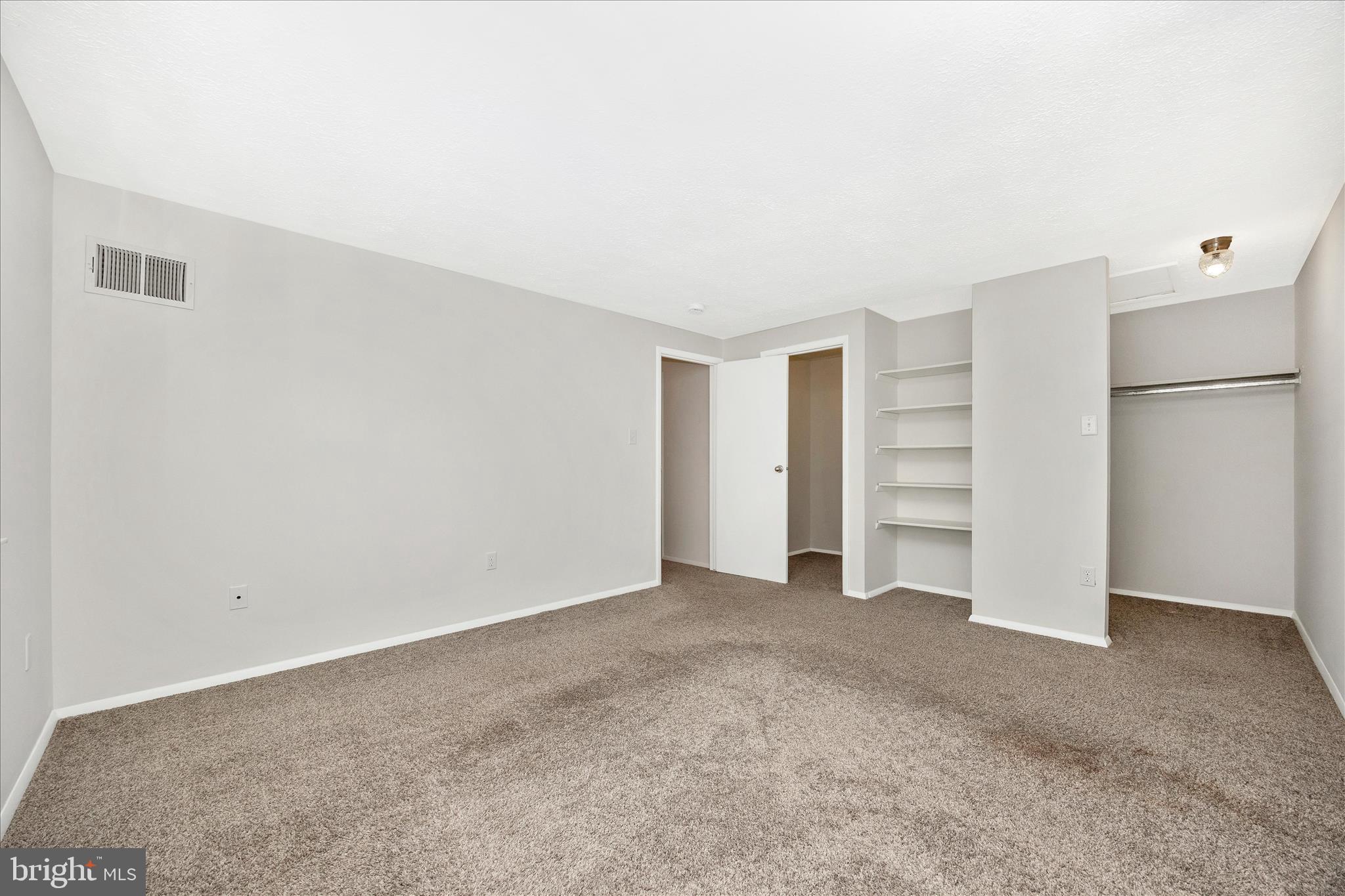 550 Heather Ridge Drive, Unit K Frederick, MD 21702 - Photo 31 of 45 a view of an empty room with closet