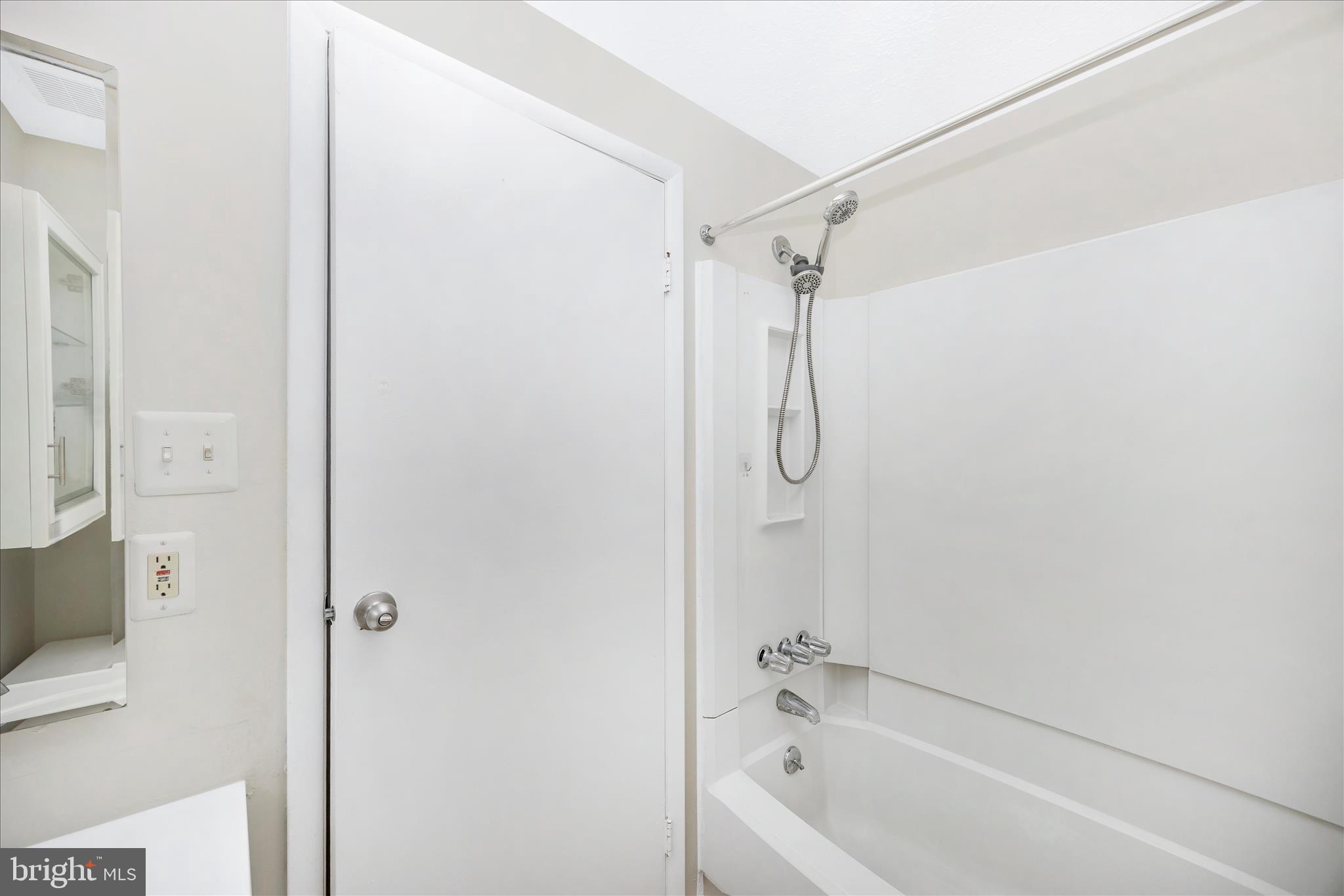 550 Heather Ridge Drive, Unit K Frederick, MD 21702 - Photo 34 of 45 a bathroom with a shower and a bath tub