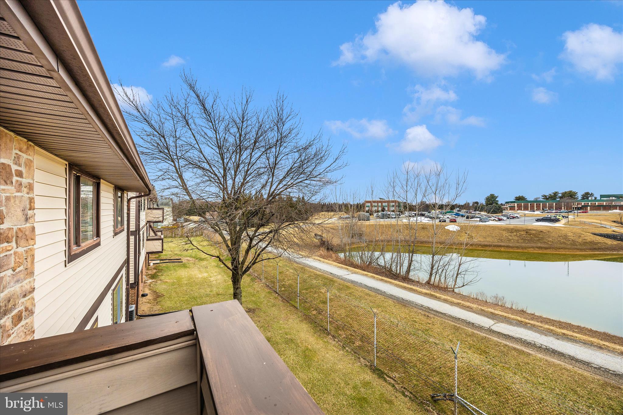 550 Heather Ridge Drive, Unit K Frederick, MD 21702 - Photo 41 of 45 a view of swimming pool with outdoor seating and wooden floor