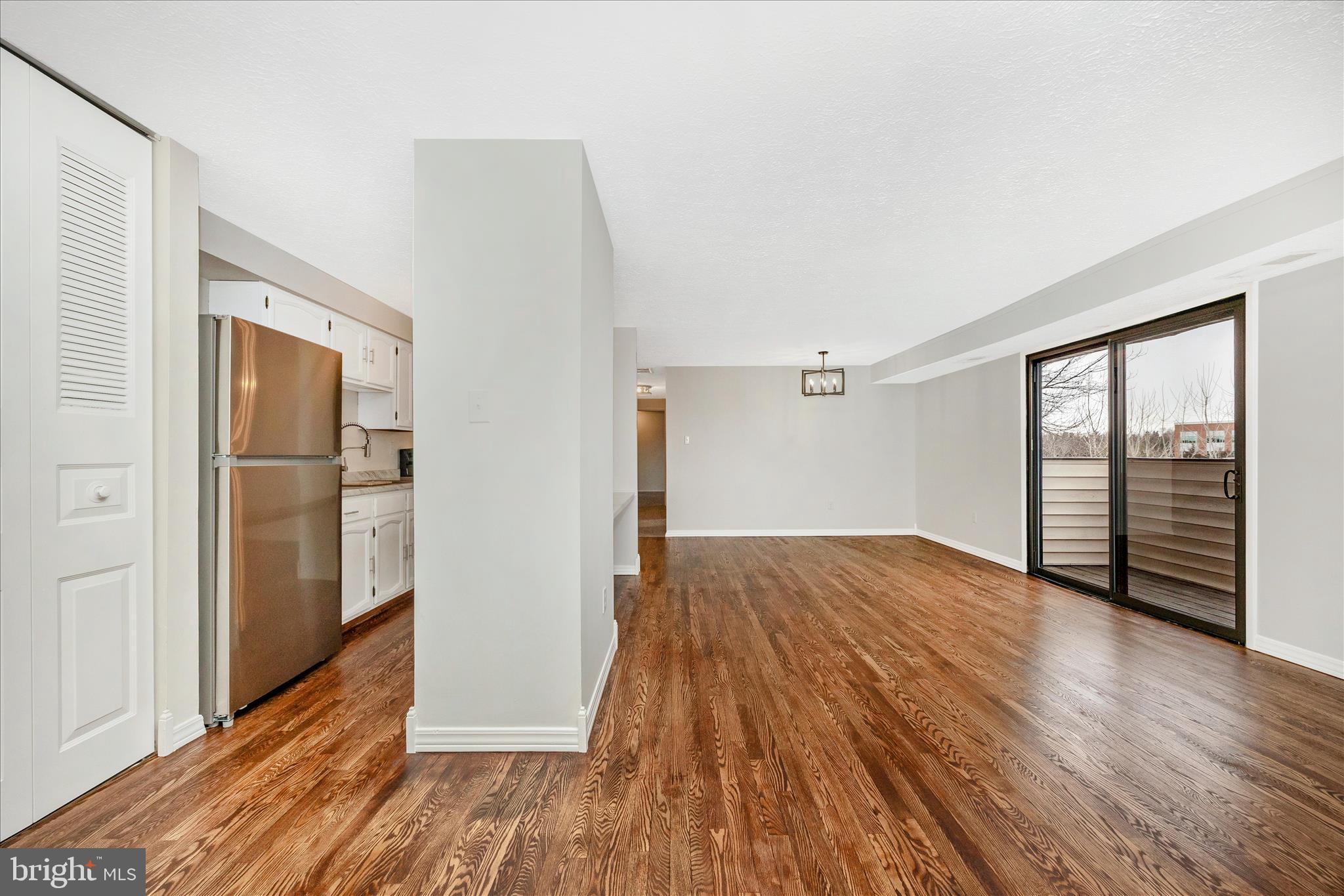 550 Heather Ridge Drive, Unit K Frederick, MD 21702 - Photo 5 of 45 a view of hallway with wooden floor