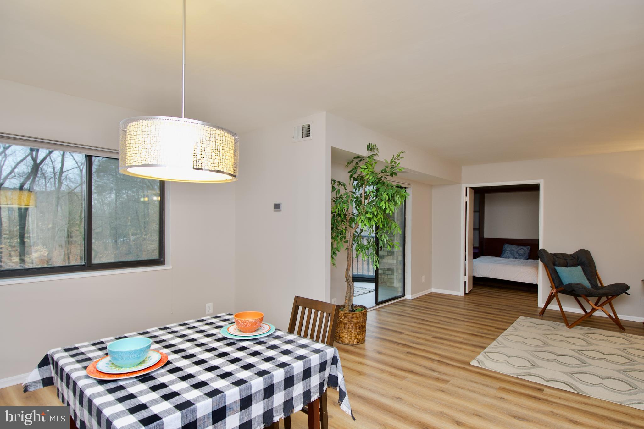 5902 Mt Eagle Drive, Unit 316 Alexandria, VA 22303 - Photo 5 of 46 Dining room w/ dramatic chandelier