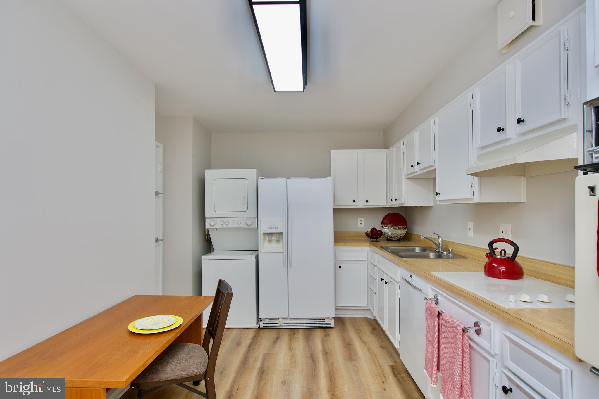 5902 Mt Eagle Drive, Unit 316 Alexandria, VA 22303 - Photo 6 of 46 Kitchen includes in-unit washer/dryer