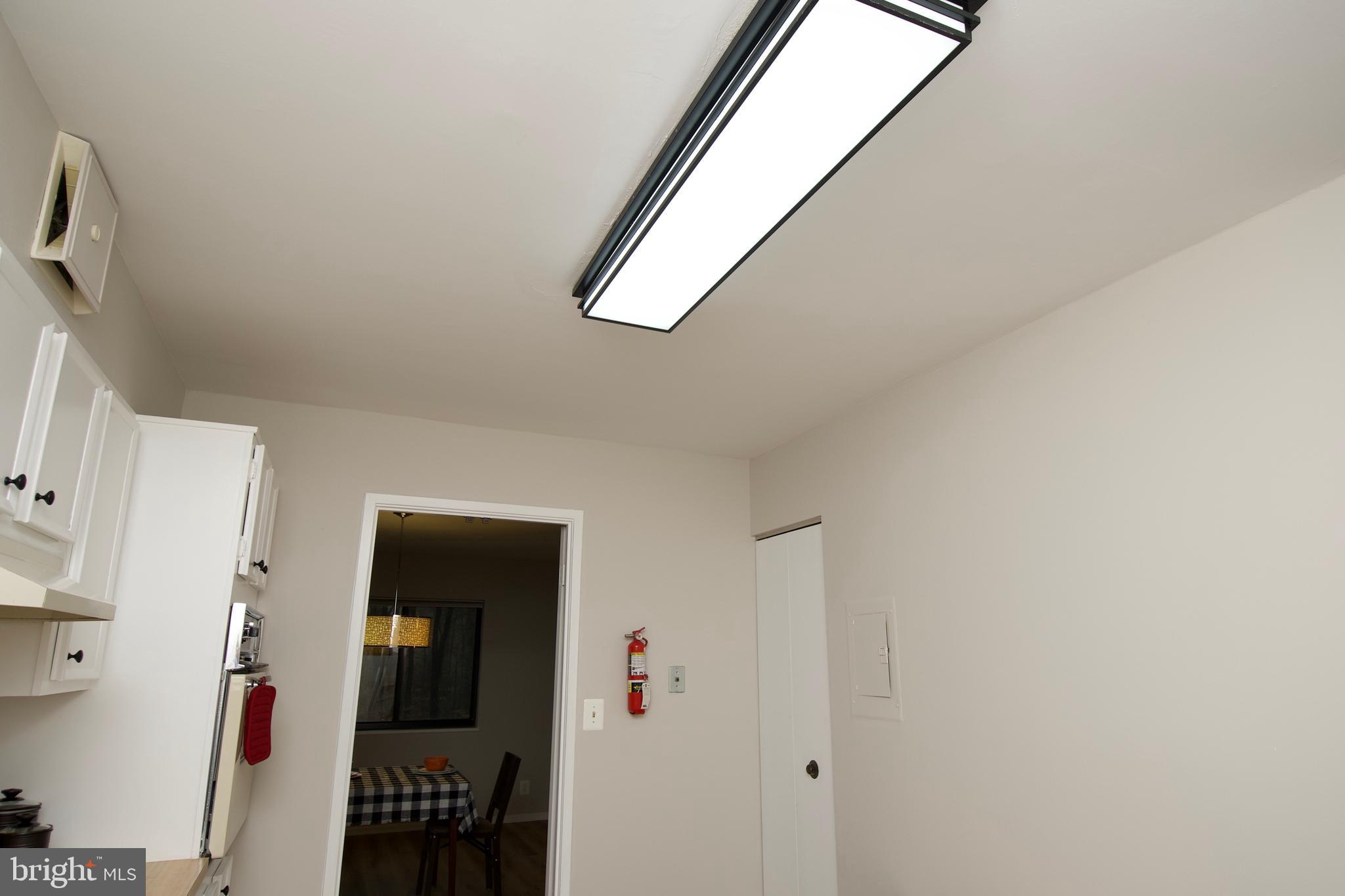 5902 Mt Eagle Drive, Unit 316 Alexandria, VA 22303 - Photo 8 of 46 Note the new light and NO popcorn ceiling!