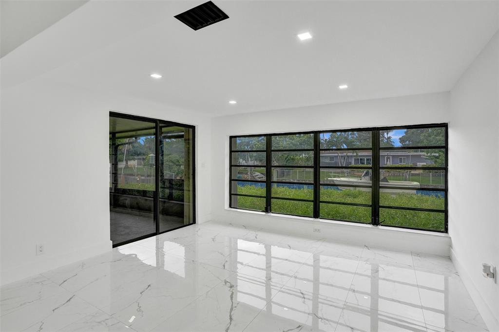 5840 Southwest 14th Street Plantation, FL 33317 - Photo 11 of 33 a view of a room with a large window