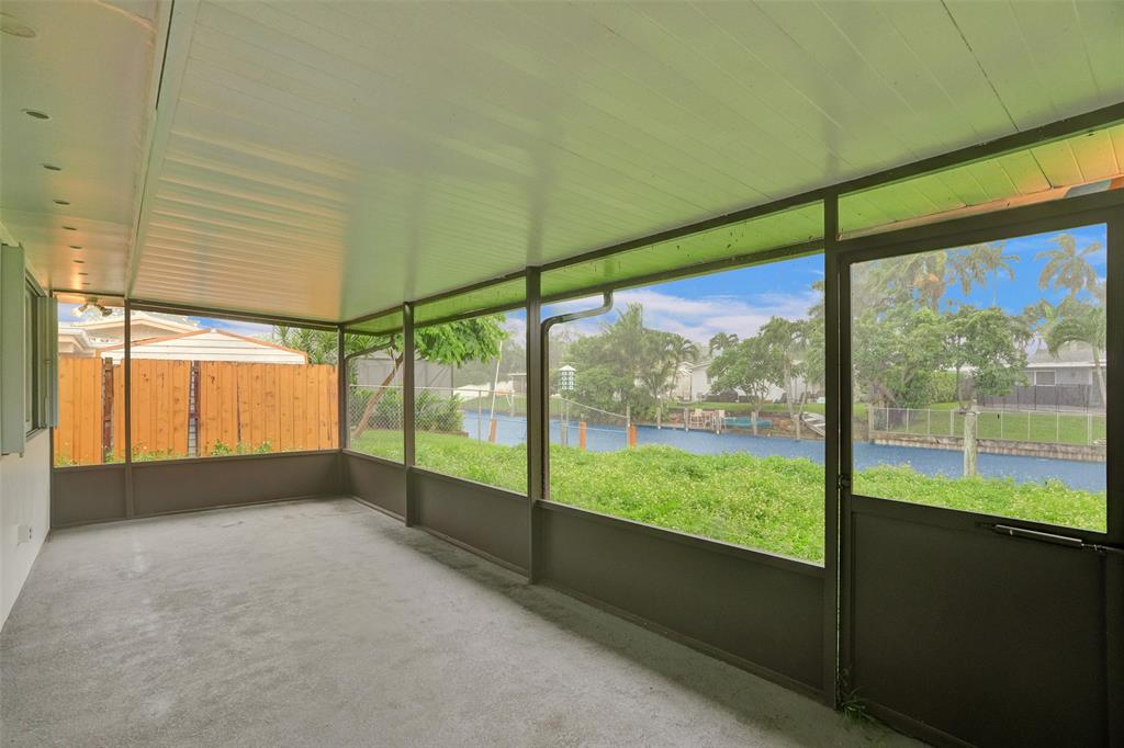5840 Southwest 14th Street Plantation, FL 33317 - Photo 24 of 33 a view of an empty room with a large window
