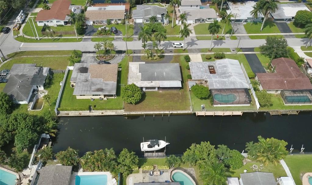 5840 Southwest 14th Street Plantation, FL 33317 - Photo 26 of 33 an aerial view of a house with a lake view