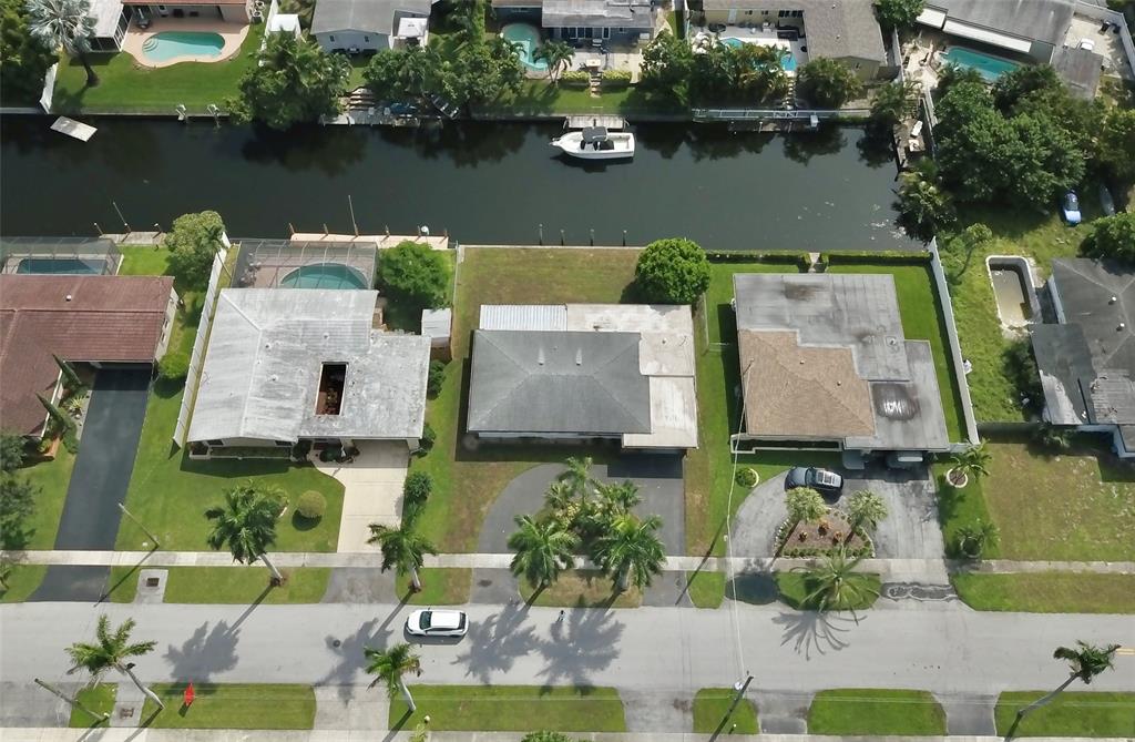 5840 Southwest 14th Street Plantation, FL 33317 - Photo 27 of 33 an aerial view of house with yard swimming pool and outdoor seating