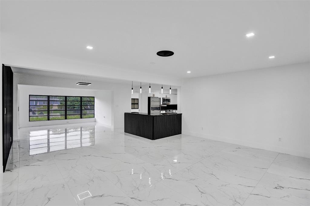 5840 Southwest 14th Street Plantation, FL 33317 - Photo 5 of 33 a living room with furniture and a flat screen tv