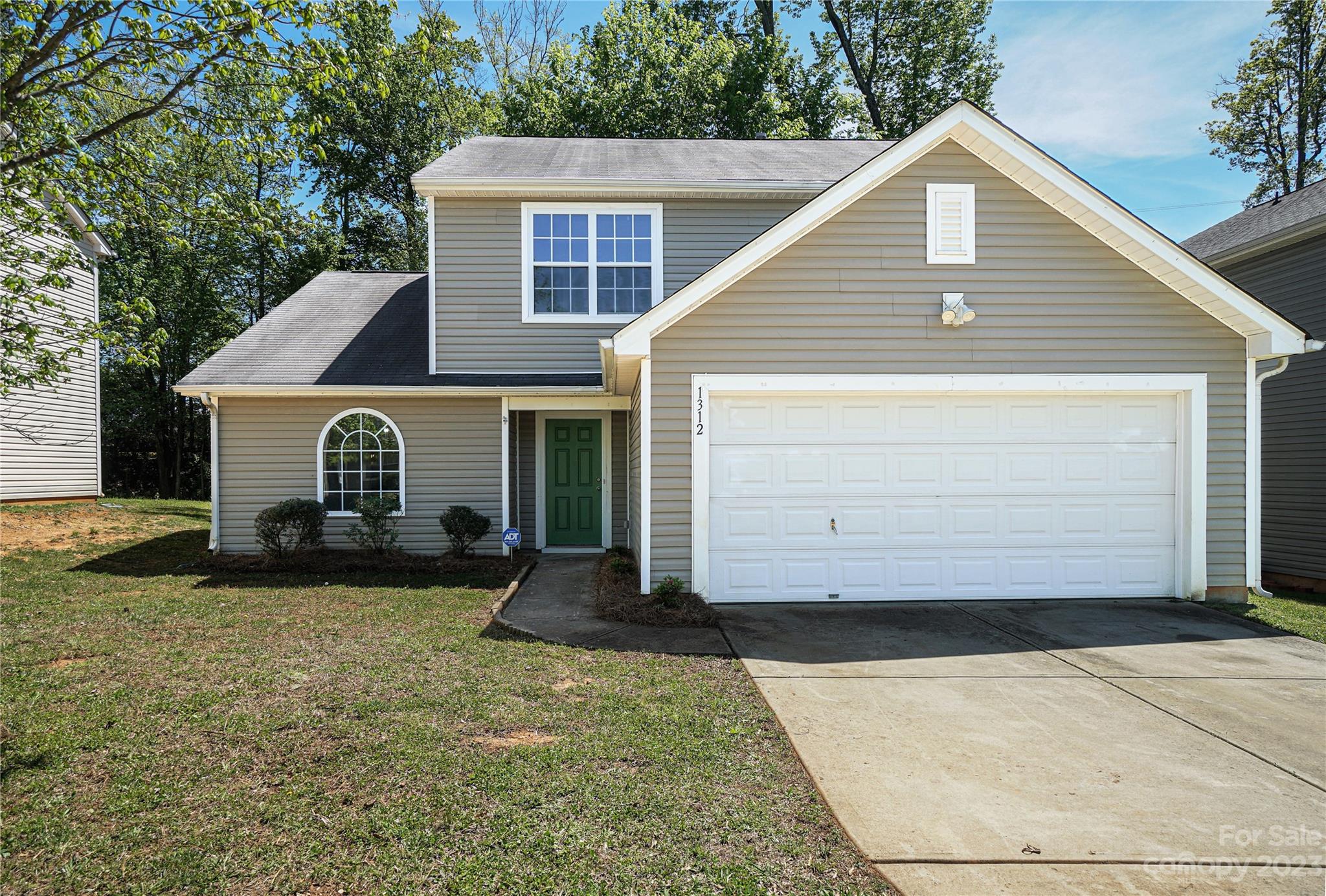 1312 Ben Livingston Road Charlotte, NC 28214 - Photo 3 of 12 a view of a house with a yard