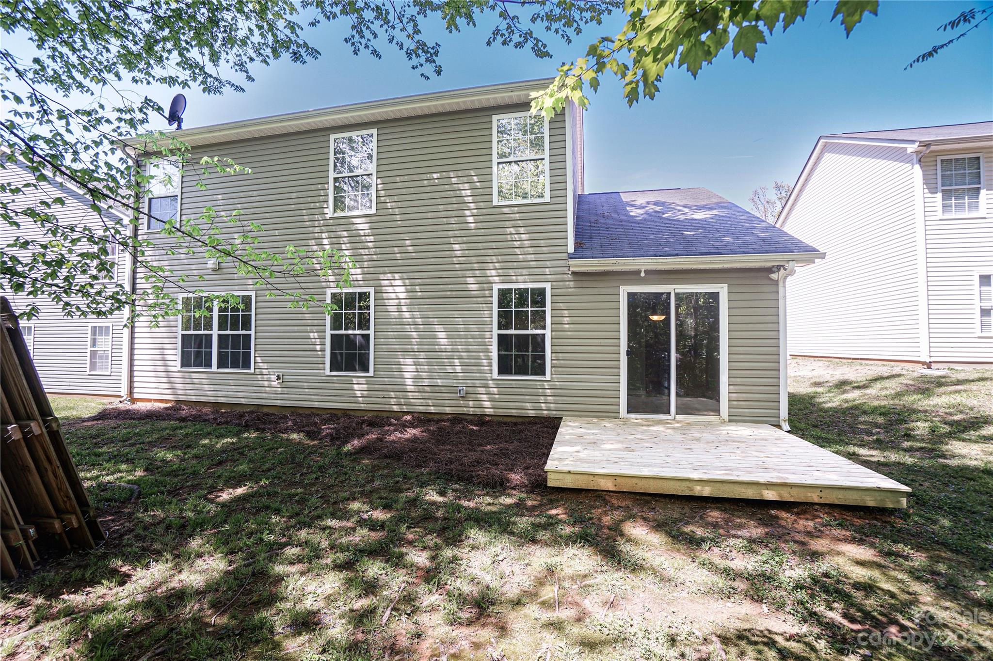1312 Ben Livingston Road Charlotte, NC 28214 - Photo 5 of 12 a front view of a house with yard
