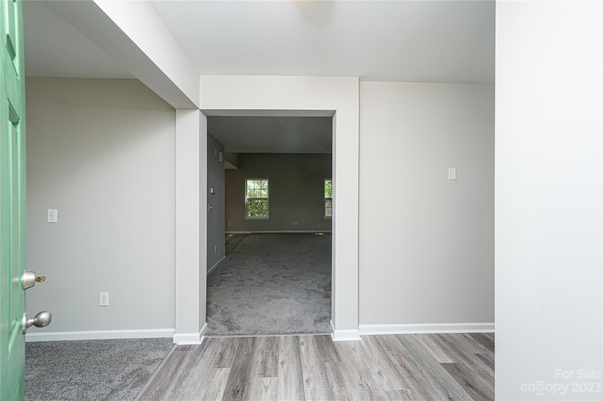 1312 Ben Livingston Road Charlotte, NC 28214 - Photo 7 of 12 a view of a room with wooden floor