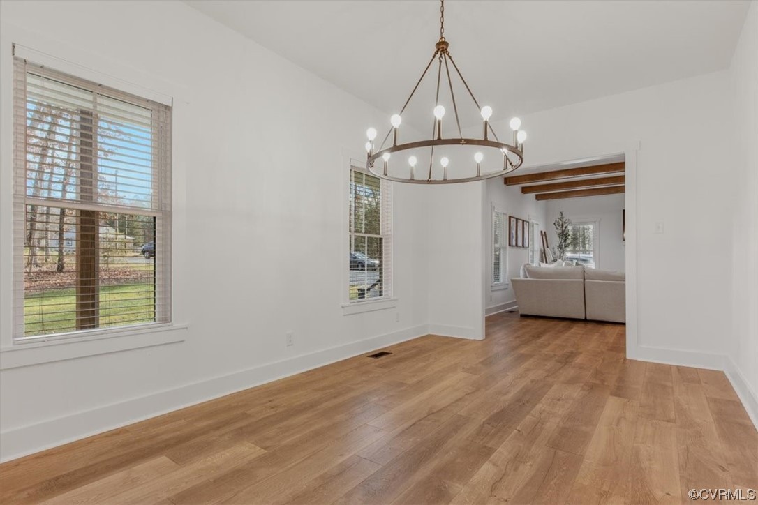 10100 Winterpock Road Chesterfield, VA 23832 - Photo 14 of 29 a view of a livingroom with a chandelier