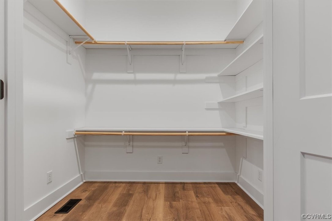 10100 Winterpock Road Chesterfield, VA 23832 - Photo 17 of 29 a view of storage and utility room with racks on the wall