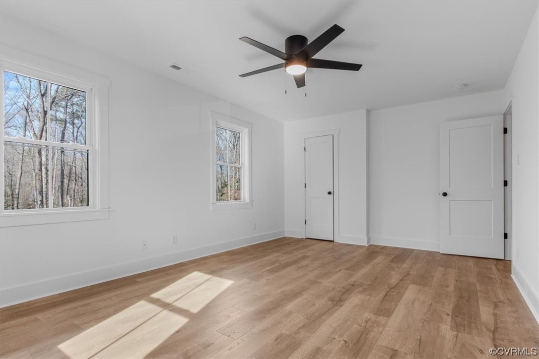 10100 Winterpock Road Chesterfield, VA 23832 - Photo 24 of 29 a view of a big room with wooden floor and windows
