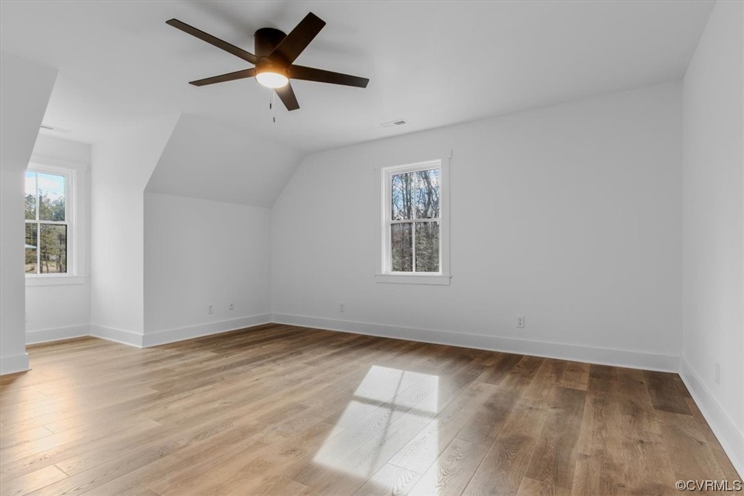 10100 Winterpock Road Chesterfield, VA 23832 - Photo 25 of 29 an empty room with wooden floor and windows