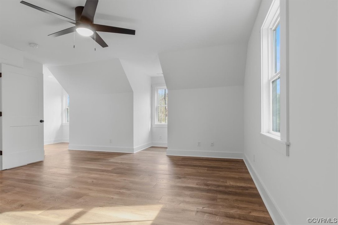 10100 Winterpock Road Chesterfield, VA 23832 - Photo 26 of 29 a view of an empty room with wooden floor and a window