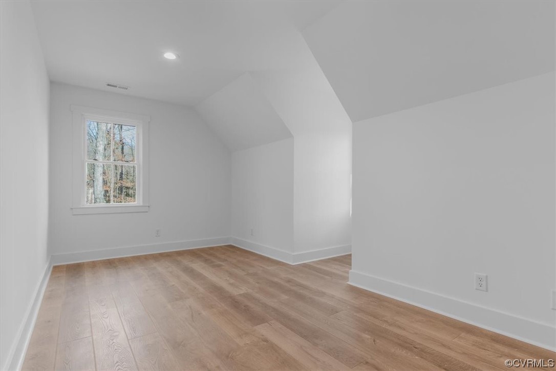10100 Winterpock Road Chesterfield, VA 23832 - Photo 28 of 29 wooden floor in an empty room with a window