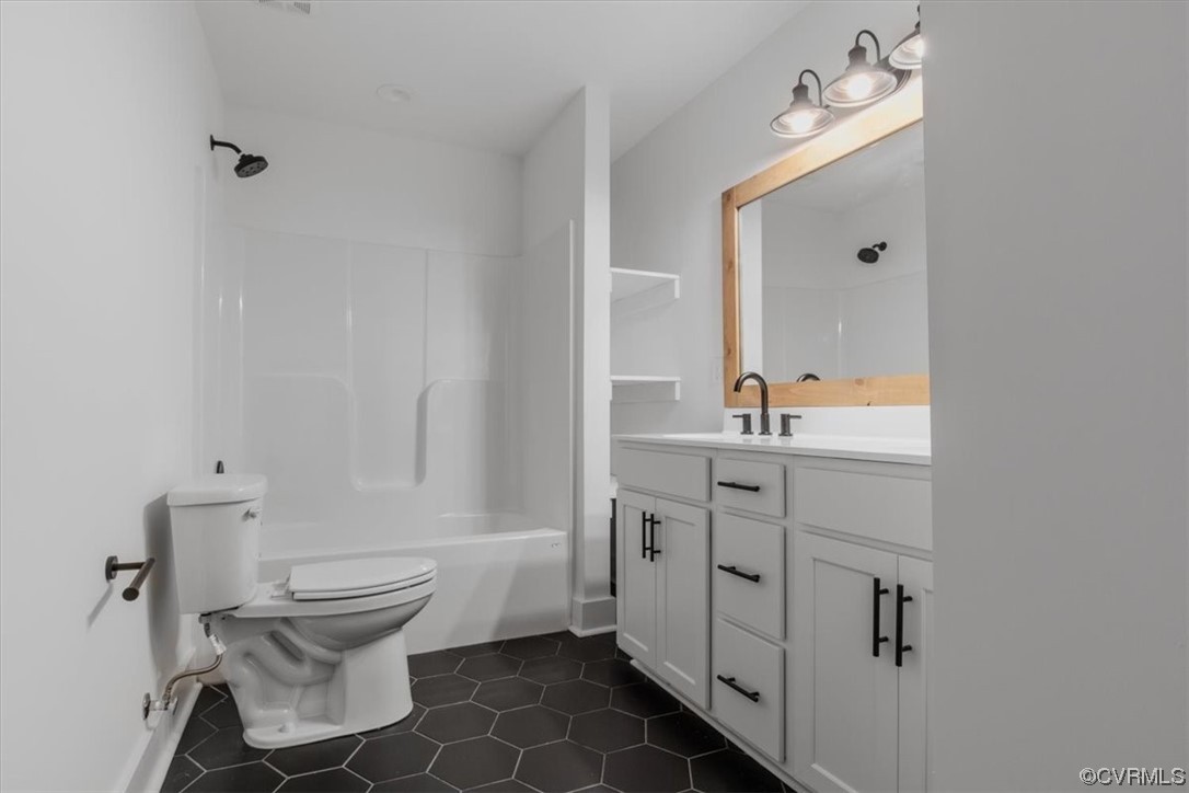 10100 Winterpock Road Chesterfield, VA 23832 - Photo 29 of 29 a bathroom with a sink toilet and mirror