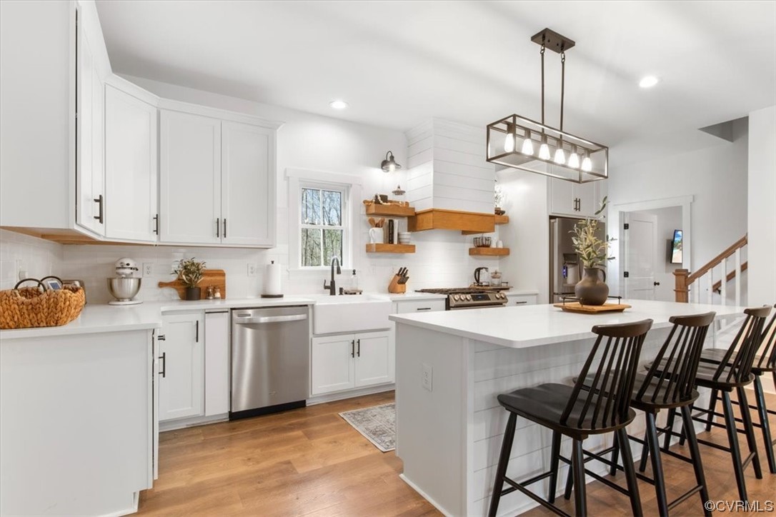 10100 Winterpock Road Chesterfield, VA 23832 - Photo 9 of 29 a kitchen that has a lot of cabinets in it and appliances