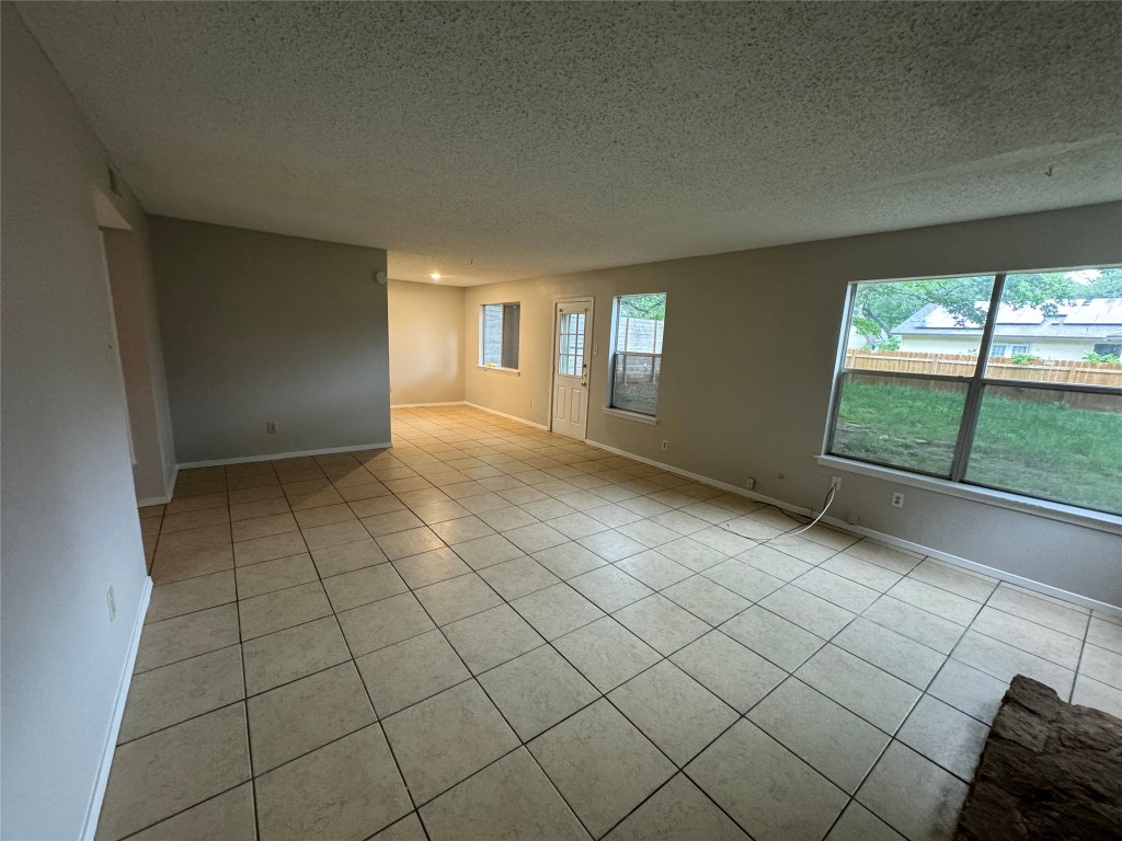 4204 Everest Lane Austin, TX 78727 - Photo 13 of 13 an empty room with windows