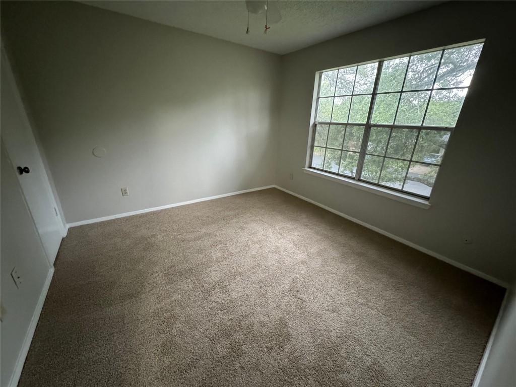 4204 Everest Lane Austin, TX 78727 - Photo 2 of 13 an empty room with a window