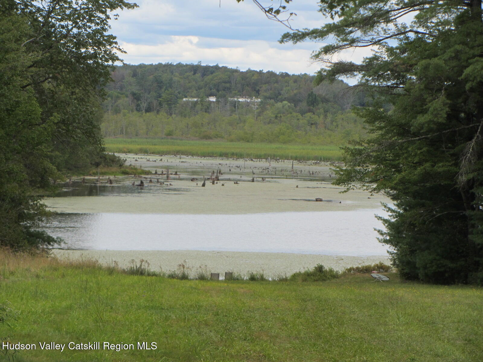 T/b/d Fraser Road Kiamesha Lake, NY 12751 - Photo 3 of 12 a view of a lake with a yard