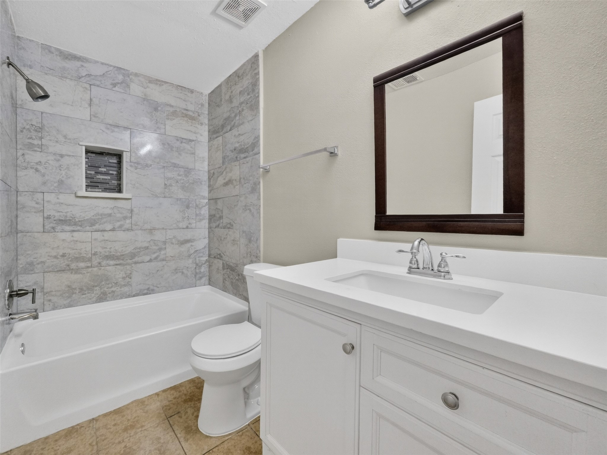 6231 Lone Prairie Way Katy, TX 77449 - Photo 21 of 27 A beautiful full bath with quartz counters and stylish finishes—perfect for guests, kids, or your self-care rituals.