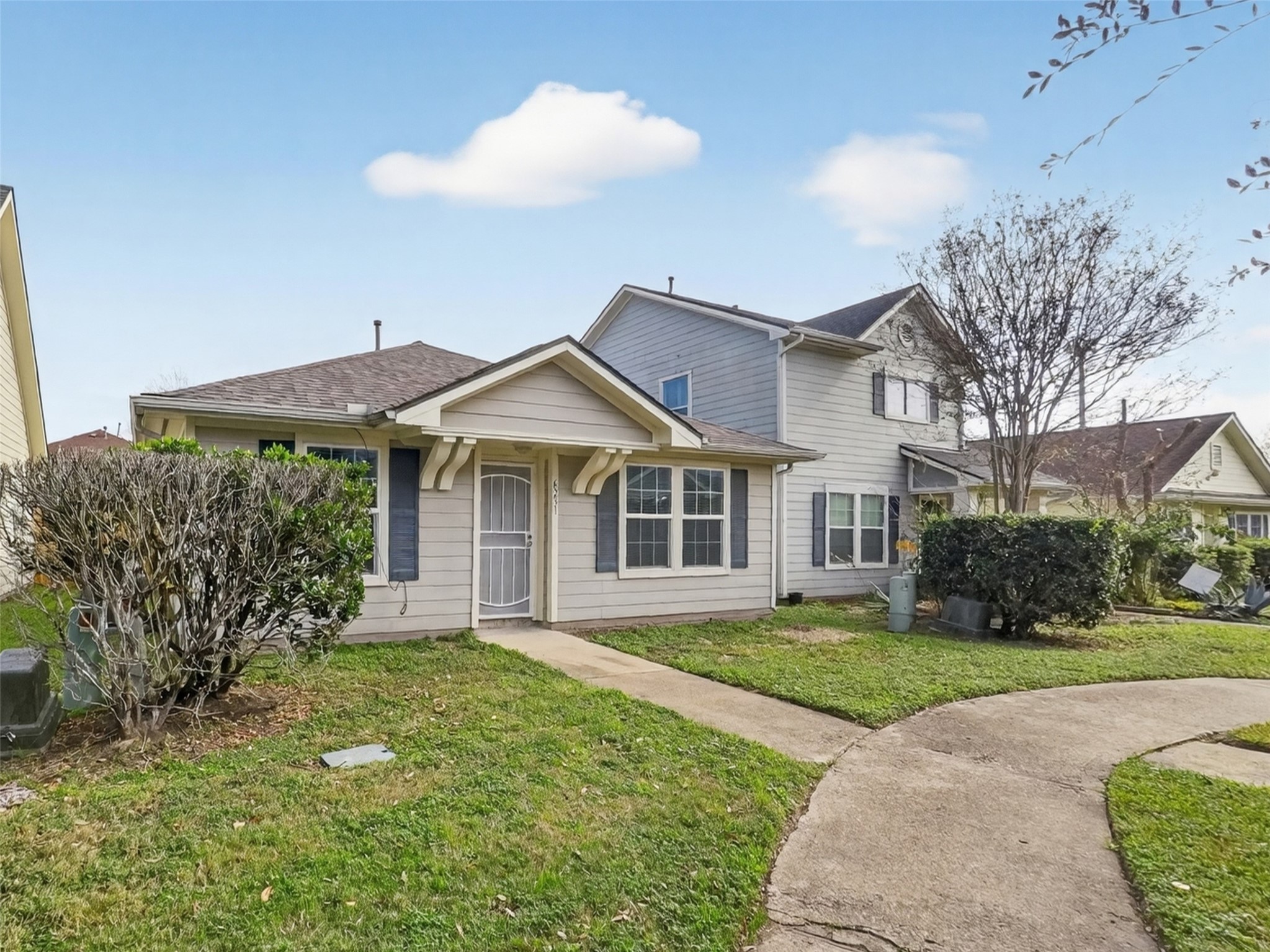 6231 Lone Prairie Way Katy, TX 77449 - Photo 3 of 27 Step up to a home that’s been reimagined top to bottom—because a great house should start with a great entrance.