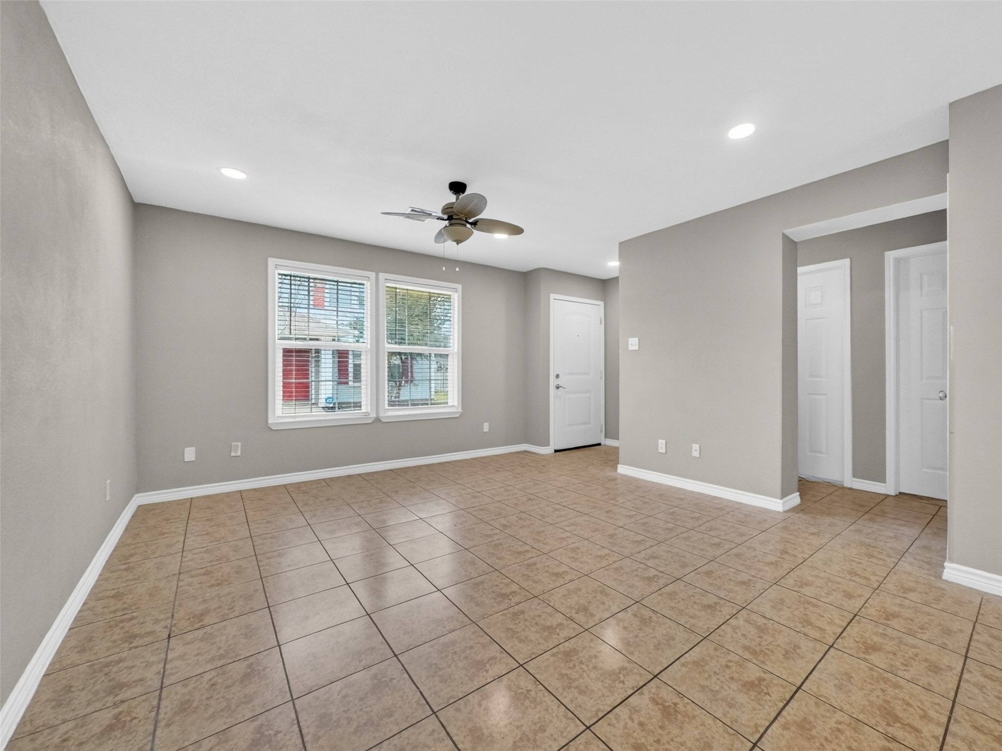 6231 Lone Prairie Way Katy, TX 77449 - Photo 5 of 27 Whether it’s game day, game night, or just a lazy Sunday, this open-concept space gives you flexibility to live loud or lounge quietly.