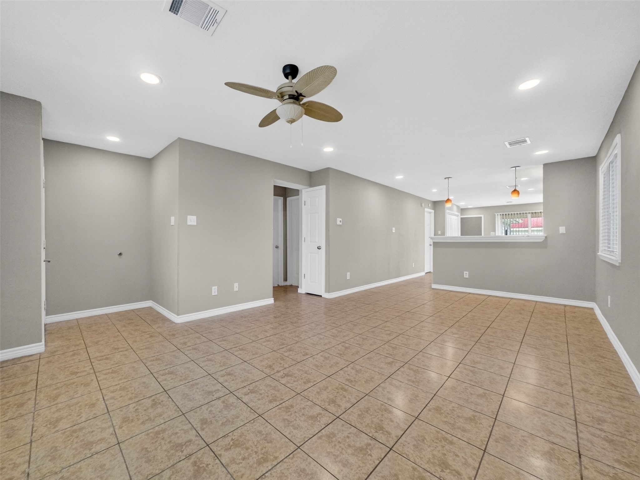 6231 Lone Prairie Way Katy, TX 77449 - Photo 6 of 27 From fort-building to holiday hosting, this generous living area flows easily to the kitchen and dining—ready for whatever life brings.