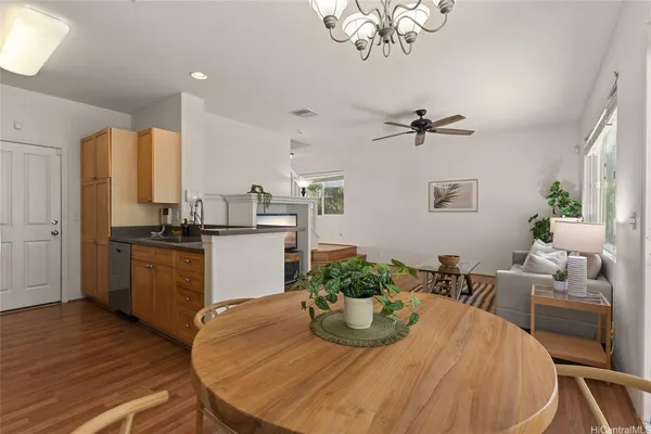a kitchen with a table and chairs