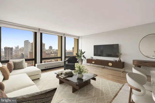 a bathroom with a sink toilet and a mirror
