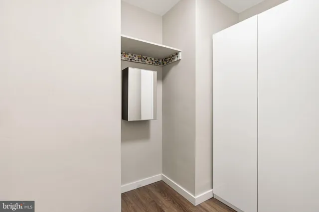 a bathroom with a granite countertop sink and a granite