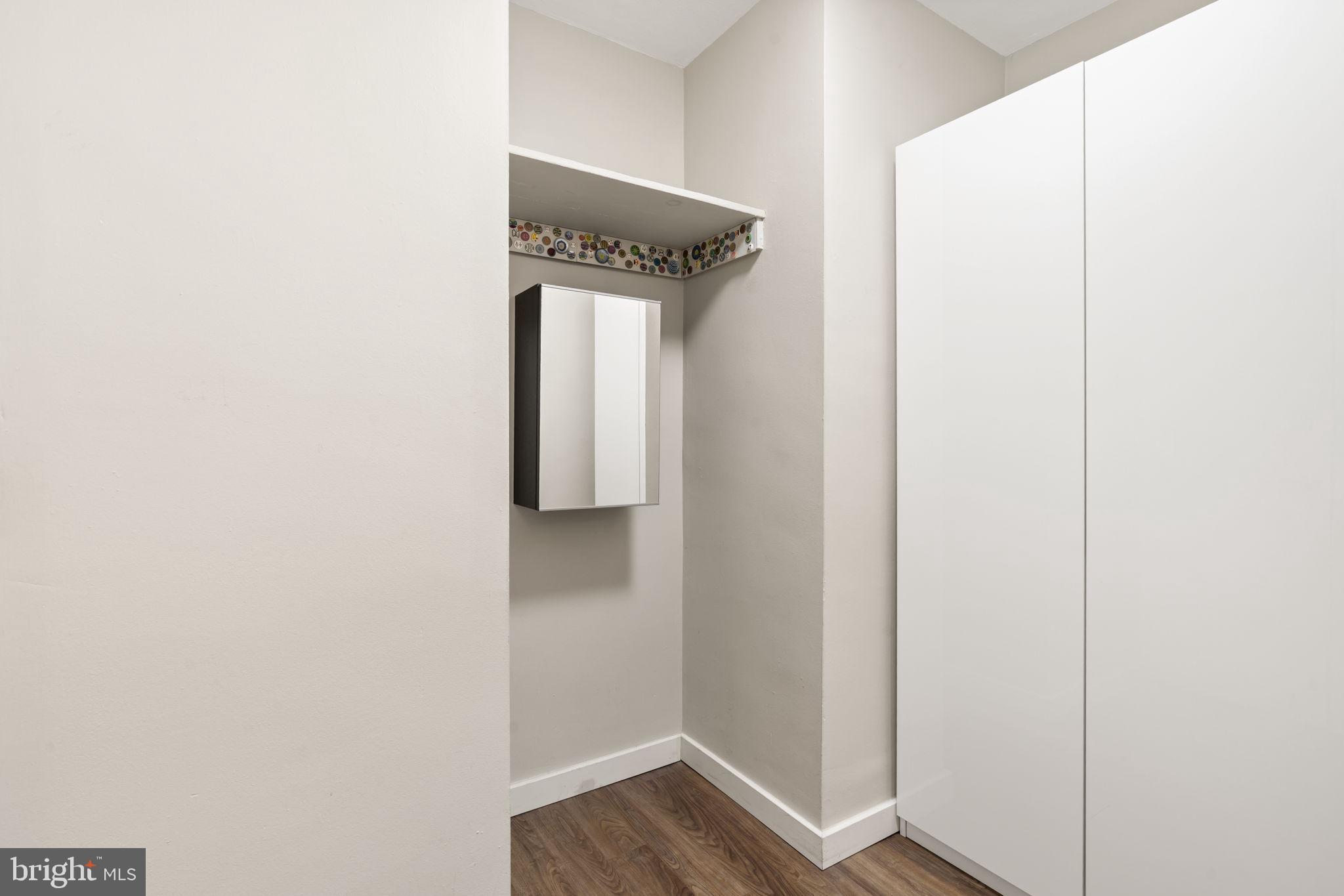 210 Locust Street, Unit 21E Philadelphia, PA 19106 - Photo 28 of 36 a view of small space with wooden floor