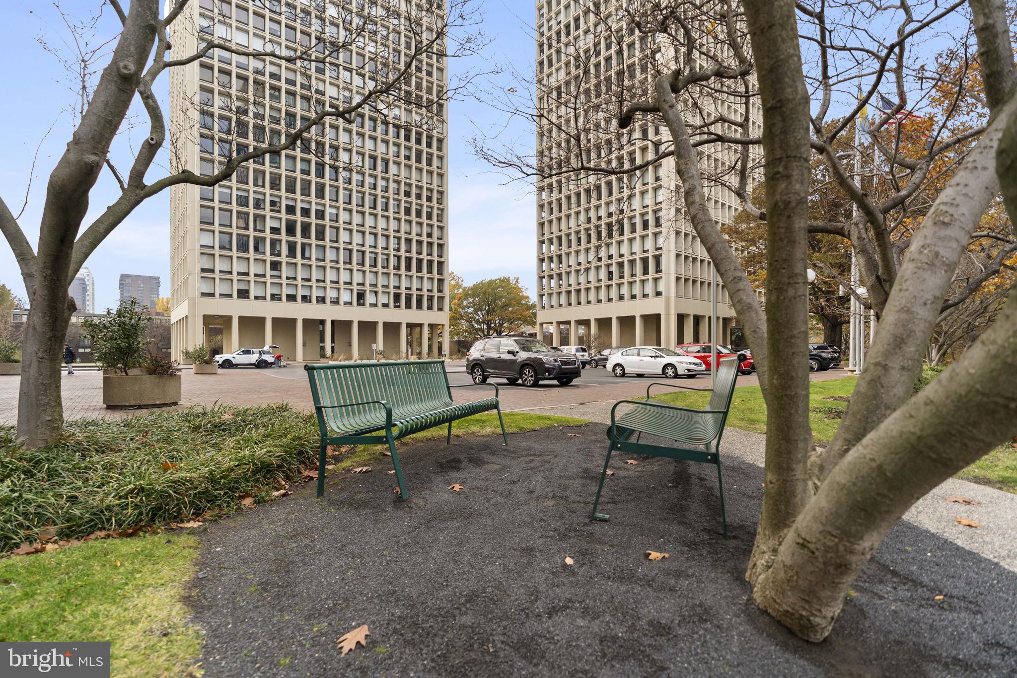 210 Locust Street, Unit 21E Philadelphia, PA 19106 - Photo 3 of 36 a view of a patio with a bench