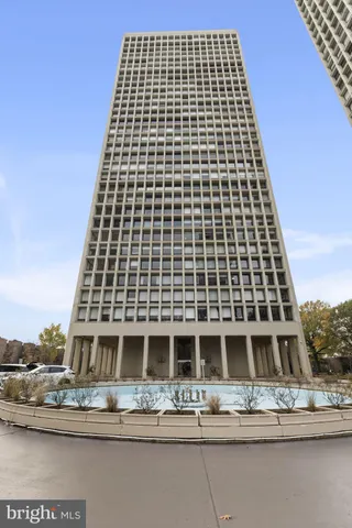 a view of a chair and table in the balcony