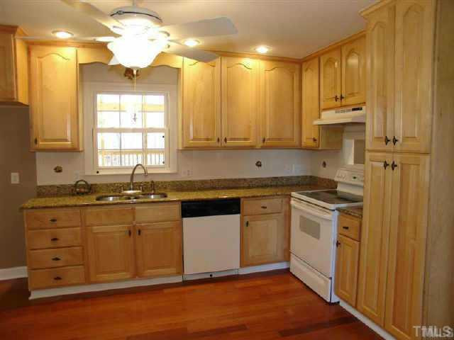 Kitchen has a new stove and dishwasher