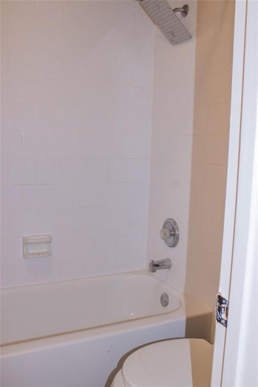 3240 Roddy Drive Fort Worth, TX 76123 - Photo 15 of 28 a bathroom with a toilet and a shower