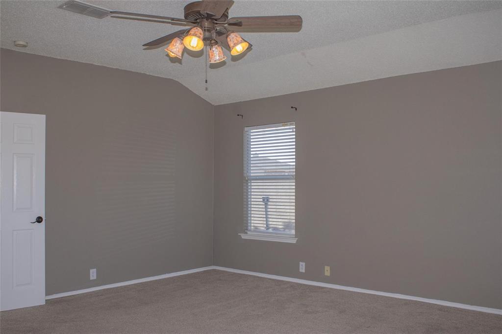 3240 Roddy Drive Fort Worth, TX 76123 - Photo 19 of 28 wooden floor in an empty room with a window