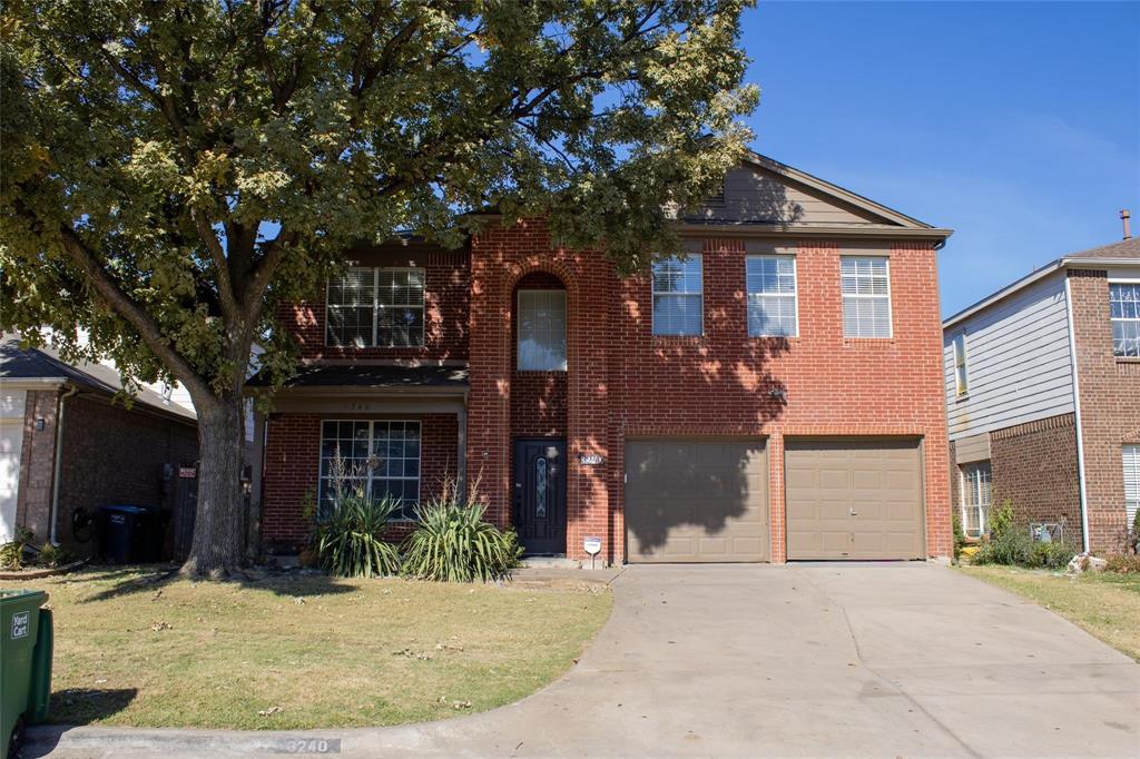 3240 Roddy Drive Fort Worth, TX 76123 - Photo 2 of 28 a front view of a house with a yard and garage