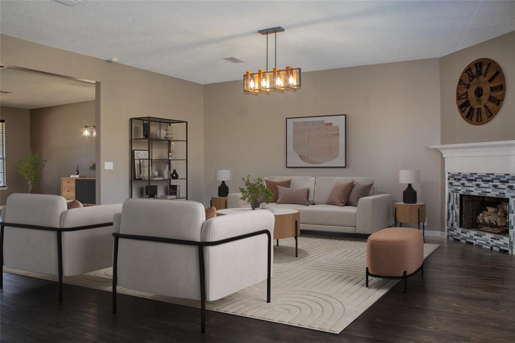 3240 Roddy Drive Fort Worth, TX 76123 - Photo 7 of 28 a living room with furniture a fireplace and wooden floor