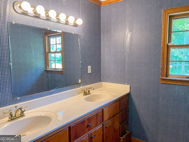 a room with wooden walls and a window