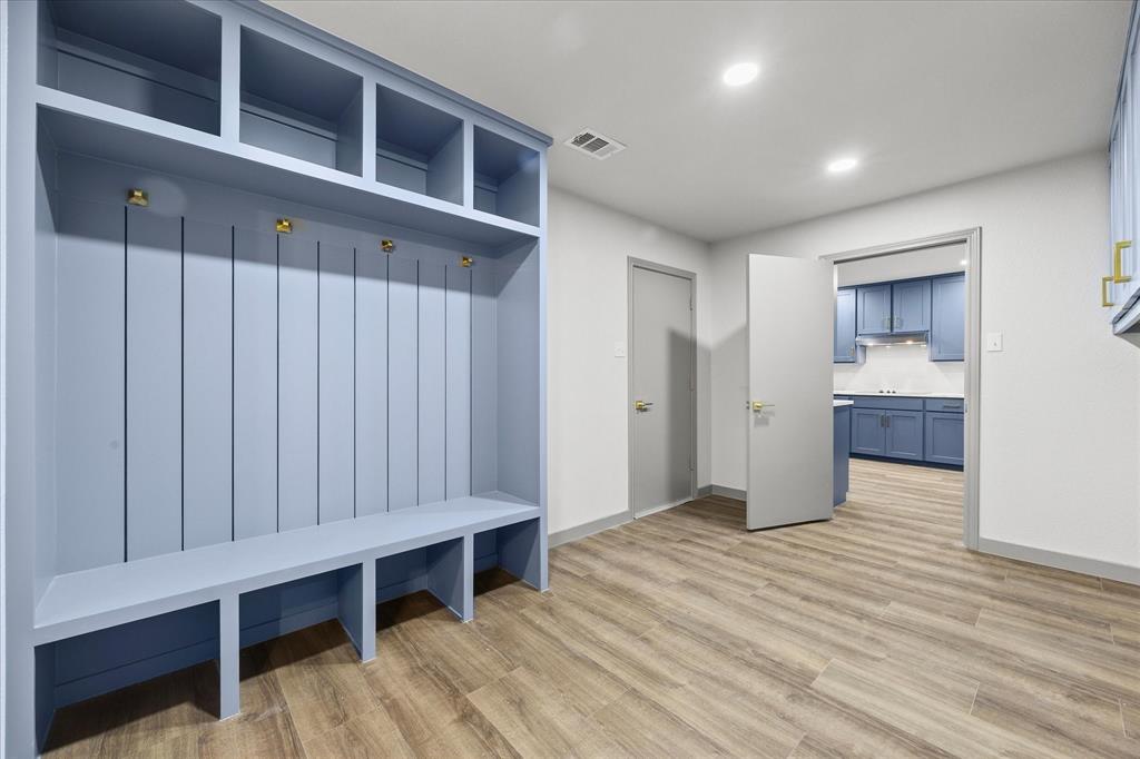 8 Harker Circle Rockwall, TX 75087 - Photo 12 of 29 a view of an empty room with wooden floor and a window