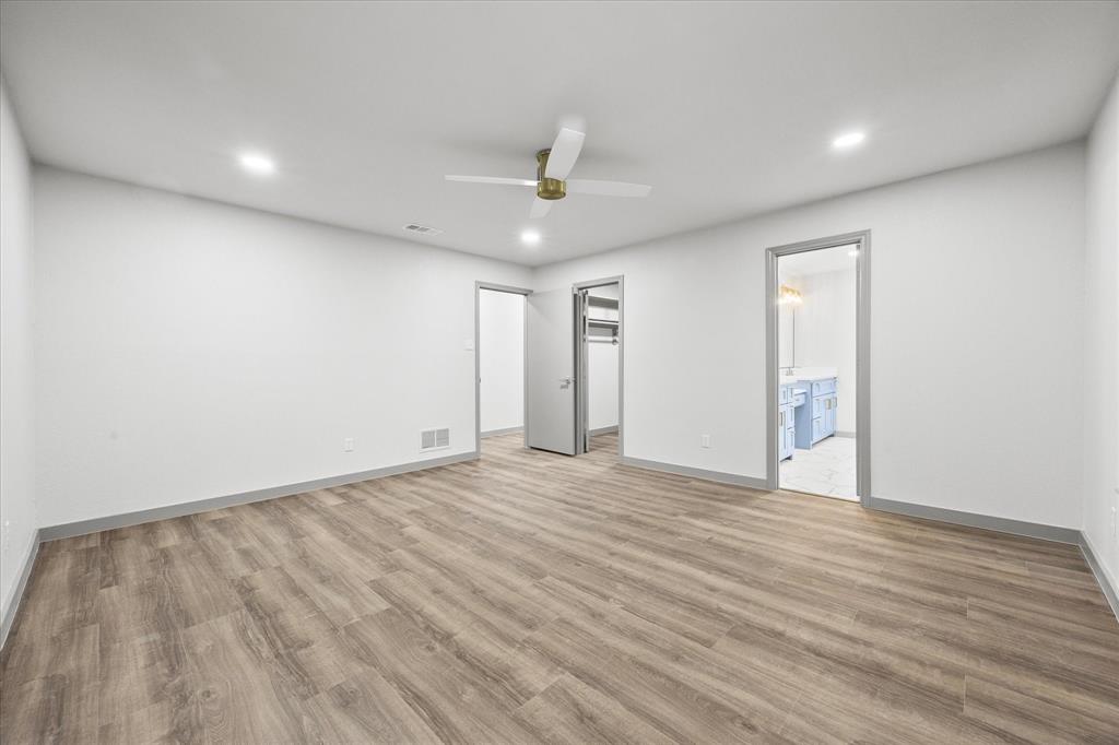 8 Harker Circle Rockwall, TX 75087 - Photo 21 of 29 wooden floor in an empty room with a window