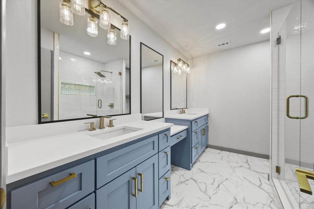 8 Harker Circle Rockwall, TX 75087 - Photo 22 of 29 a bathroom with a double vanity sink mirror and double