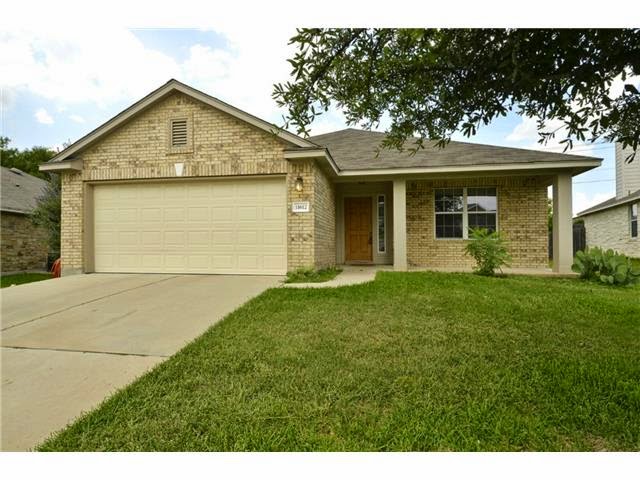 11612 Timber Heights Drive Austin, TX 78754 - Photo 2 of 28 A classic brick exterior and well-maintained lawn welcome you to this inviting home.